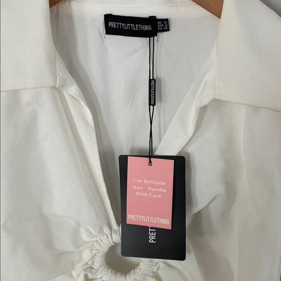 PrettyLittleThing White Mini Dress with Ring Detail Sz 8 - Picture 2 of 5